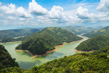 Mountain landscape surrounded by rivers. Hidromiel dam, Caldas, Colombia