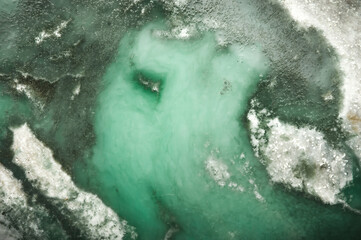 Variscite macro detail texture background. close-up raw rough unpolished semi-precious gemstone