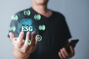 human are raising the planet to save energy,and reduce global warming,idea for environment conscious business,carbon credit,reducing greenhouse gas emissions,ESG for Environment Social and Governance