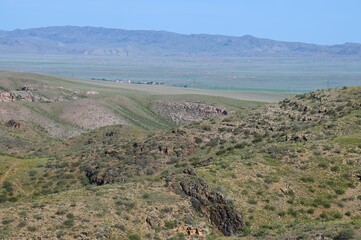 Archarly pass. View from top of the hills above the road connecting Kaochagay and Saryozek