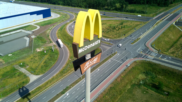 Aerial view, Mc Donalds sign close to highway, near Warsaw, Poland, May 23, 2023