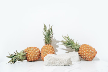Tropical cosmetics skin care product presentation scene made with empty pumice stone and juicy...