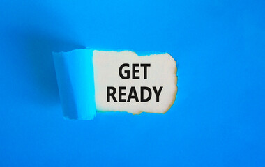 Get ready symbol. Concept words Get ready on a beautiful white paper on a beautiful blue background. Business, support, motivation and get ready concept. Copy space.