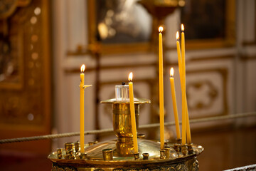 Prayer Candles inside of an old church in alaska