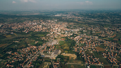 Areal drone footage of a suburb small town with private houses