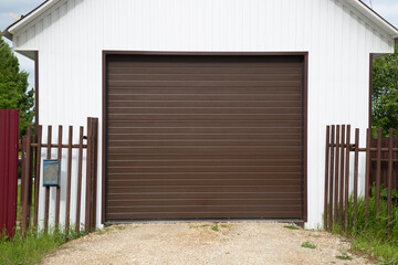 Garage doors, roller shutters.Installation of garage doors.