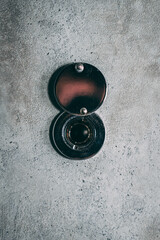 The peephole on the gray door