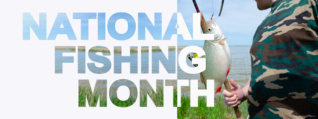 National Fishing Month hobby concept. Text on the background of a caught fish in the hands of a fisherman.