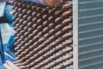 Radiator of a refrigeration monoblock made of aluminum and copper. - obrazy, fototapety, plakaty