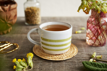 Herbal tea with cowslip or primrose medicinal herb