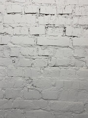 Brick wall, painted white.