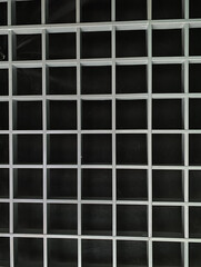 Slatted ceiling, gray on a black background