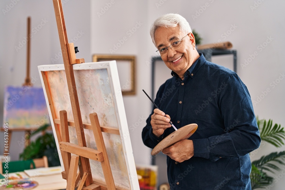 Wall mural Senior man smiling confident drawing at art studio