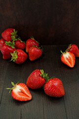 fresh strawberries on a wooden background