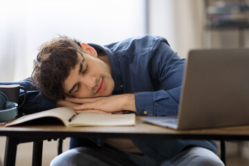 Arabic Businessman Near Laptop Having Break For Nap At Workplace