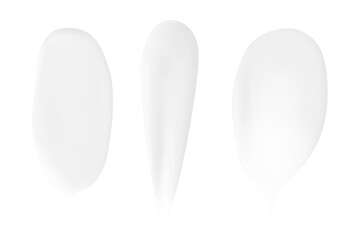 A set of different strokes of white cream on a blank background. PNG