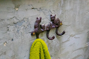 hanger in the form of a cat on the wall