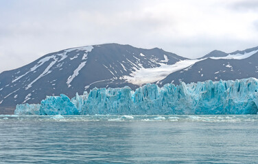 Fototapeta na wymiar Dramatic Ice Columns on a Glacial Front