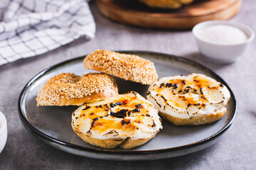Creme brulee bagels with cream cheese and caramelized sugar on a plate