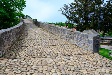 Cangas de Onis, mountain village with old roman ruins and bridge, Picos de Europa mountains, Asturias, North of Spain