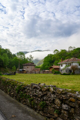 Driving narrow mountain road from Los Arenas to remote mountain village Sotres, Picos de Europa mountains, Asturias, North of Spain