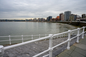 View on houses and San Lorenzo beach in Gijon, Asturias, Spain