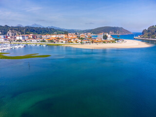 Obraz premium Vacation on Costa Verde, Green coast of Asturias, Ribadesella village with sandy beaches, North of Spain