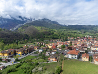 Fototapeta na wymiar Aerial view on Los Arenas, mountain village where famous cabrales cheese is produced, Picos de Europa mountains, Asturias, North of Spain