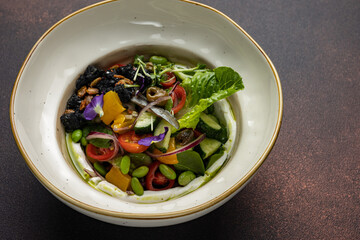 A delicious salad from a restaurant. Close-up