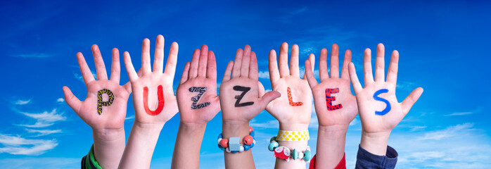 Children Hands Building Word Puzzles, Blue Sky