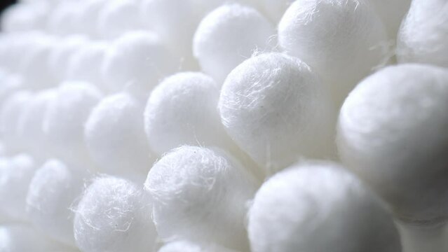 Captivating macro video of cotton buds, shot with a probe lens. Explore the intricate details and textures of these everyday objects in stunning close-up footage.
