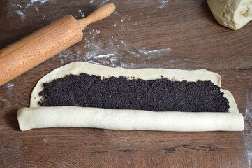 Preparing homemade poppy seed roll