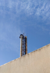 Industrial chimney equipped with bird spikes