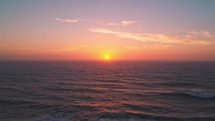 Aerial view of sunset over the sea