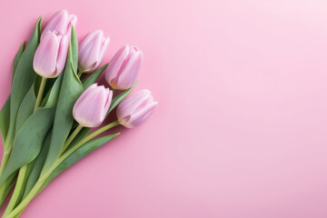 Gorgeous spring tulip flowers elegantly displayed in a flat lay style on a pink background. A delightful choice for Spring Sale banners or greetings on Women's or Mother's Day.  generative AI.