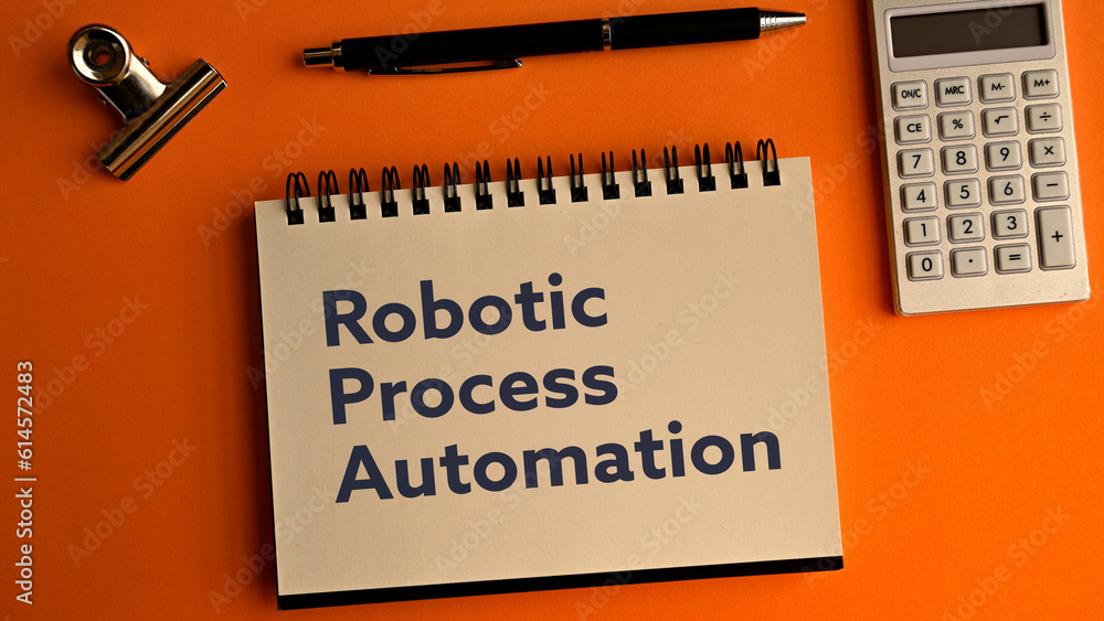 Poster there is notebook with the word robotic process automation. it is as an eye-catching image.