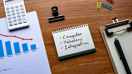 There is notebook with the word Computer Telephony Integration. It is as an eye-catching image.