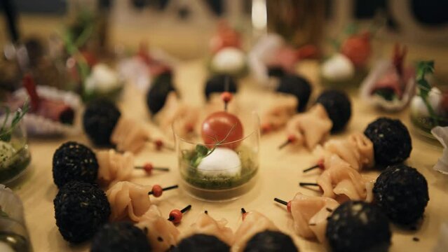 A beautiful and delicious treat was shot close-up on the table. Canapé close-up