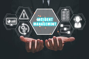 Incident Management process Business Technology concept, Business person hand holding incident management icon on virtual screen.