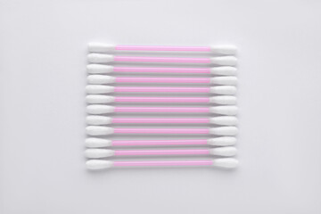 Clean cotton buds isolated on white, top view