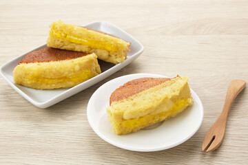 Kue Pukis with pineapple jam, made from flour, yeast, egg, sugar and then baked. Indonesian traditional food
