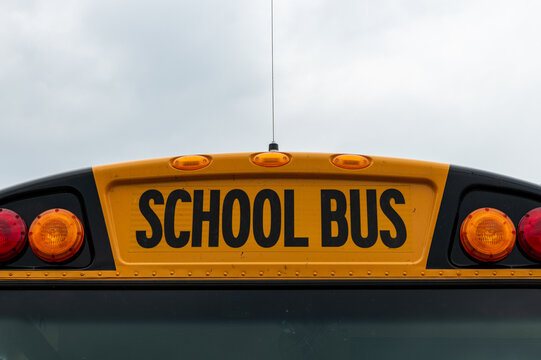 School Bus Sign a Top of the Front to the Bus