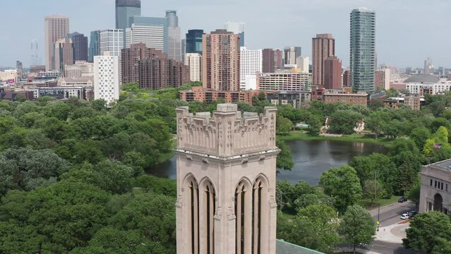Aerial close-up panning shot around the belltower of Saint Mark's Episcopal Cathedral in downtown Minneapolis, Minnesota. 4K