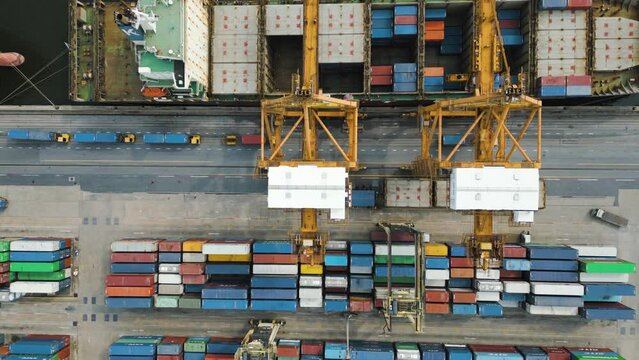 Efficient Port Operations: Loading and Unloading Container Ship Vessels with Dynamic Crane Activity for Global Trade and Logistics Success