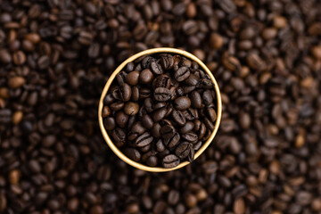 Macrophotography of roasted coffee beans.