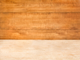 Wooden table top on blur wood wall background - can be used for display or montage your products