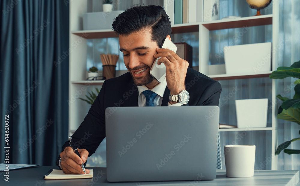 Aufkleber diligent businessman busy talking on the phone call with clients while working with laptop in his of