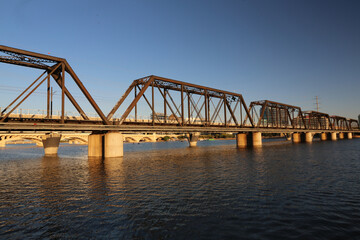 Fototapeta na wymiar Railroad Bridge over the river