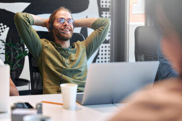 Successful hipster team in coworking. Freelancers.