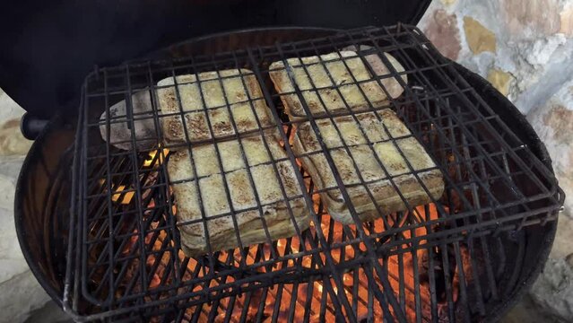 Braai or barbecue of sandwich on a weber